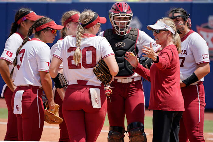 Oklahoma softball coach Patty Gasso talks to her team